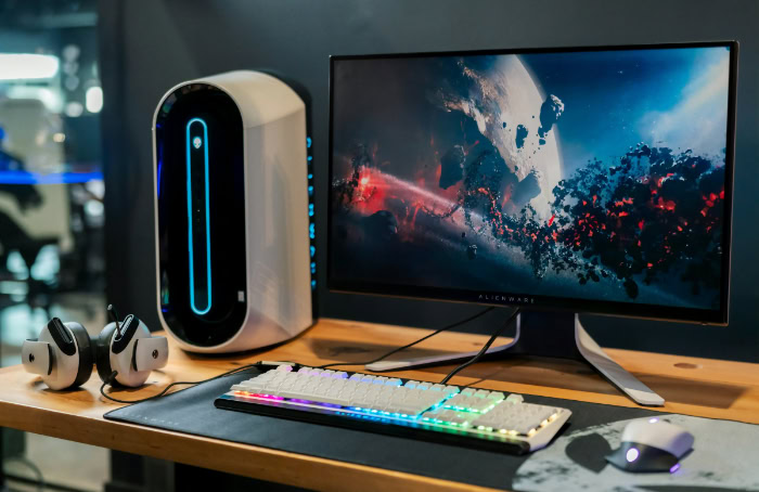 Alienware gaming setup with RGB keyboard and monitor