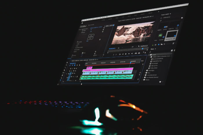 Video editing software open on a monitor screen